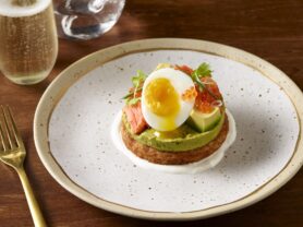A photo of a Smoked Salmon California Avocado Hummus and Potato Rosti